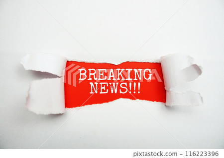 Breaking News!!! message written on red paper with torn paper background Breaking News!!! message written on red paper with torn paper background 116223396