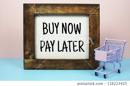 Buy Now Pay Later text message with trolley cart for business and commercial concepts background Buy Now Pay Later text message with trolley cart for business and commercial concepts background 116223425