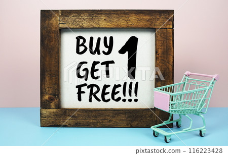 Buy 1 Get 1 Free!!! Sale promotion with trolley shopping cart on pink and blue background Buy 1 Get 1 Free!!! Sale promotion with trolley shopping cart on pink and blue background 116223428