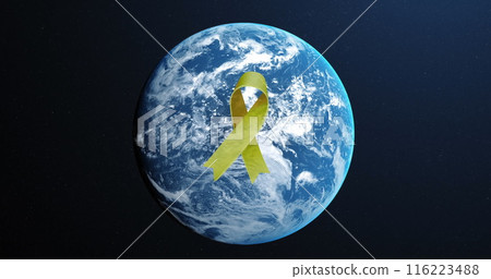 Image of yellow ribbon over globe on blue background, copy space 116223488