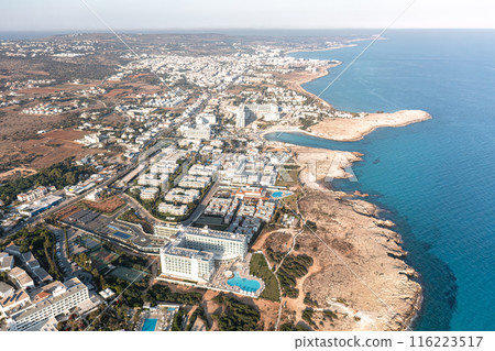 Aerial view of coastal town and beachfront. Ayia Napa, Cyprus 116223517