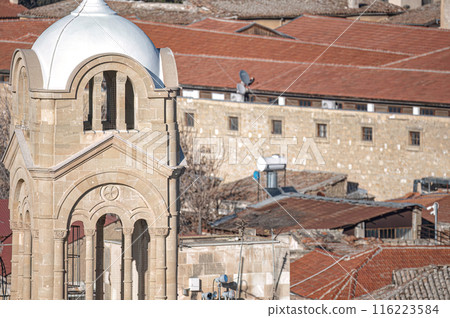 Panagia Faneromeni church tower rising above traditional houses with tile roofs in Nicosia city, Cyprus Panagia Faneromeni church tower rising above traditional houses with tile roofs in Nicosia city, Cyprus 116223584