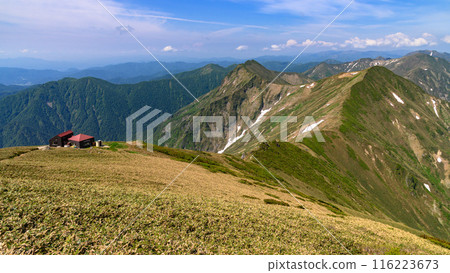 The main ridge of the Tanigawa mountain range and Katano hut in early summer The main ridge of the Tanigawa mountain range and Katano hut in early summer 116223673