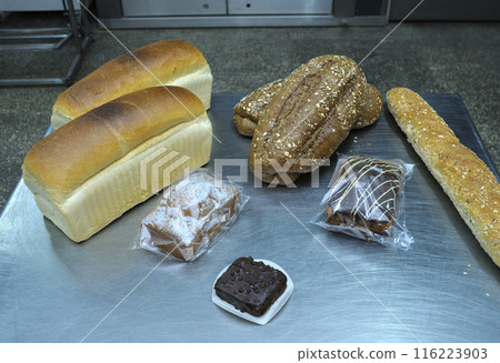 Dutch bakery products placed on a tray: bread, rolls, muffins 116223903
