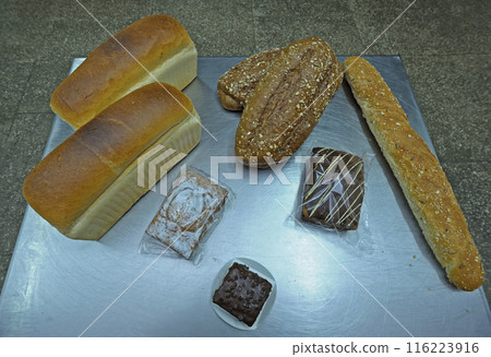 Dutch bakery products placed on a tray: bread, rolls, muffins Dutch bakery products placed on a tray: bread, rolls, muffins 116223916