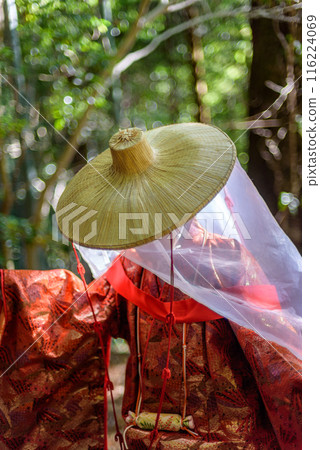 Japanese woman wearing traditional Heian Period costume at the Kumano Kodo Pilgrimage Route in Wakayama prefecture of Japan Japanese woman wearing traditional Heian Period costume at the Kumano Kodo Pilgrimage Route in Wakayama prefecture of Japan 116224069
