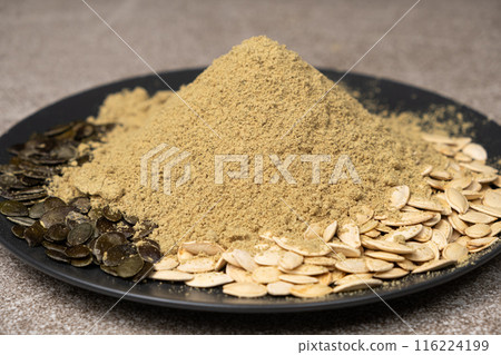 Flour from ground fresh pumpkin seeds, a superfood, a plant-based source of protein and vitamins. 116224199