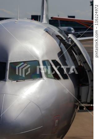 Front view of a jet plane 116224972