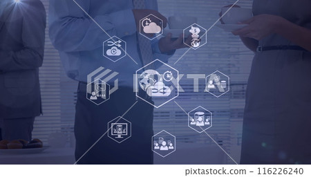 Image of digital icons over mid section of businessman and businessman drinking coffee at office 116226240
