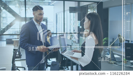 Image of moving lines with changing dates over diverse coworkers discussing reports in office 116226284