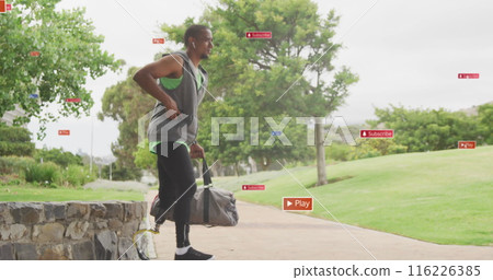 Image of notification icons over african american male athlete with prosthetic leg in park Image of notification icons over african american male athlete with prosthetic leg in park 116226385