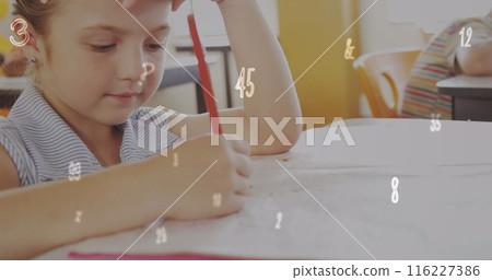 Image of changing numbers and multiple symbols, caucasian girl writing in book 116227386