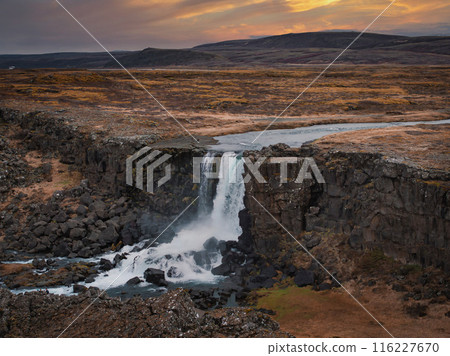 Aerial panorama of the Oxarafoss waterfalls in Iceland. Oxarafoss also called Oxararfoss is located in the Thingvellir National Park on the Oxara River. The tectonic plates of America and Eurasia. 116227670