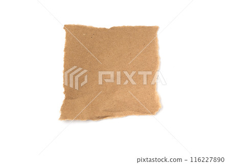 A torn piece of craft paper isolated on a white background. Perfect for eco-friendly designs and art projects A torn piece of craft paper isolated on a white background. Perfect for eco-friendly designs and art projects 116227890
