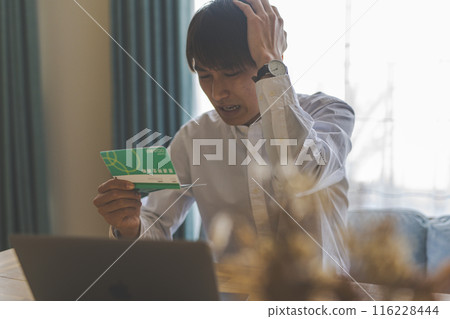 Men seeing passbooks 116228444