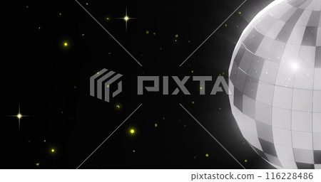 Image of retro disco mirror ball and glowing spots on black background 116228486