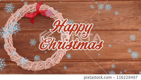 Image of christmas greetings text over snow falling and christmas decorations Image of christmas greetings text over snow falling and christmas decorations 116228487
