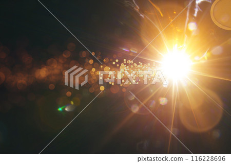 Abstract imitation sun starlight distant galaxy on a black background. 116228696