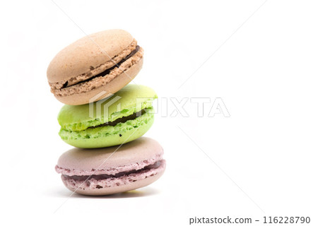 Pile of colorful macarons isolated white background 116228790