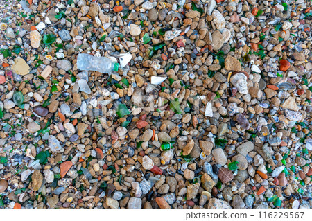 Microplastics on Sand Beach. Micro Plastics Garbage, Tiny Trash Pieces, Microplastic Waste, Dirty Shore 116229567
