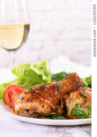 Fried chicken drumstick with gravy Fried chicken drumstick with gravy 116230169