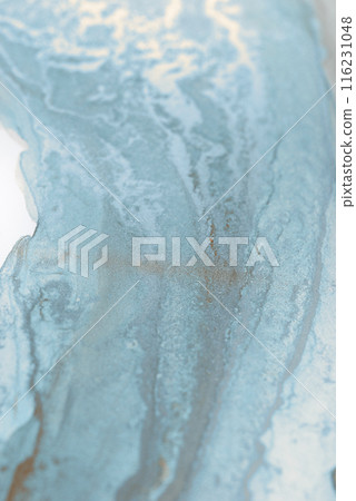A close-up abstract image showcasing swirling patterns in shades of blue and white. The textures resemble water or ink, creating a dreamy, ethereal effect A close-up abstract image showcasing swirling patterns in shades of blue and white. The textures resemble water or ink, creating a dreamy, ethereal effect 116231048