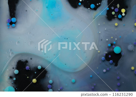 A myriad of oil droplets intermingling with water, creating a mesmerizing effect reminiscent of a galaxy. 116231290