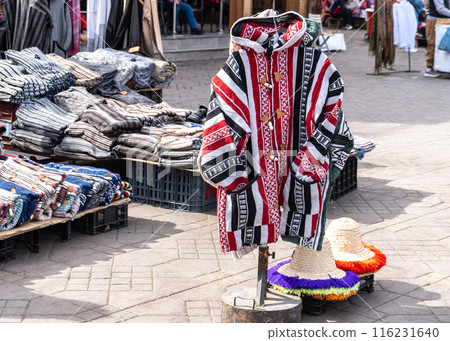 Traditional Moroccan clothes - djellaba at the old market in Morocco, tourist shop in Marrakech Medina, editorial image 116231640