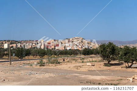 Morocco semi-deserts and mountains, north africa nature, Moroccan stone desert, red hills, villages and argan trees 116231707