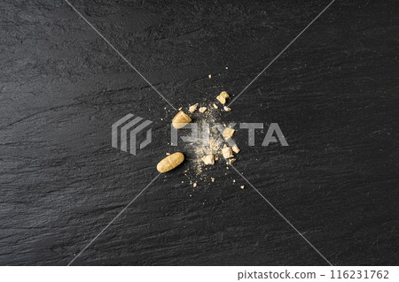 Broken Pills, Crushed Aspirin, Split Tablet, Broken Pill Capsules, Crumbling White Drugs on Black 116231762