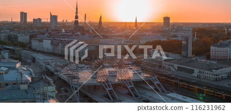 Huge Rail Baltic construction sight project in progress in Riga, Latvia. Building a main central train station in the center of Riga. Aerial view. 116231962