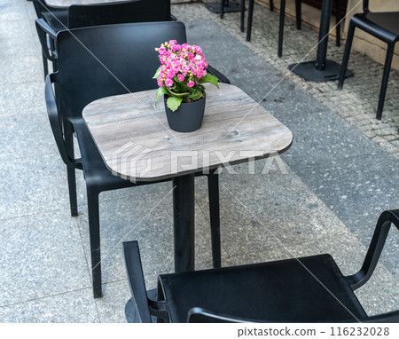 Street Restaurant Table Flower Decoration, Empty Cafe Tables, Bistro Seat, Bar Terrace, Outdoor Restaurants Street Restaurant Table Flower Decoration, Empty Cafe Tables, Bistro Seat, Bar Terrace, Outdoor Restaurants 116232028