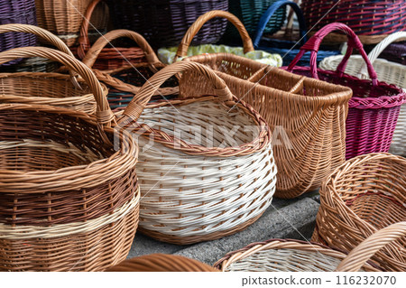 Many Wicker Baskets on Handicraft Market, New Wickerwork, Hand Made Basket, Bamboo Containers Many Wicker Baskets on Handicraft Market, New Wickerwork, Hand Made Basket, Bamboo Containers 116232070