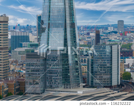Close up view of the Shard skyscraper in London. The tallest building in the EU. Business center of London. Close up view of the Shard skyscraper in London. The tallest building in the EU. Business center of London. 116232222