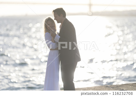 Couple Dancing at Sunset - man and woman Couple Dancing at Sunset - man and woman 116232708