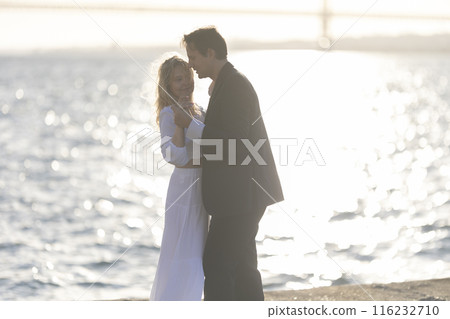 Couple Dancing at Sunset by the Bay Couple Dancing at Sunset by the Bay 116232710