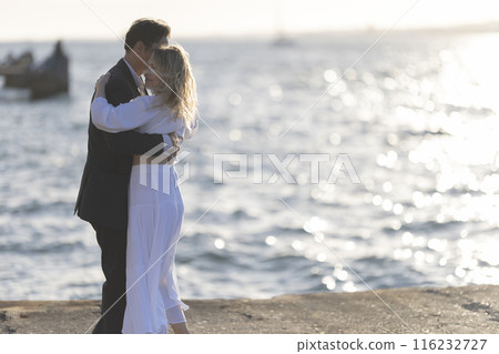 Couple Dancing at Sunset by the Sea Couple Dancing at Sunset by the Sea 116232727