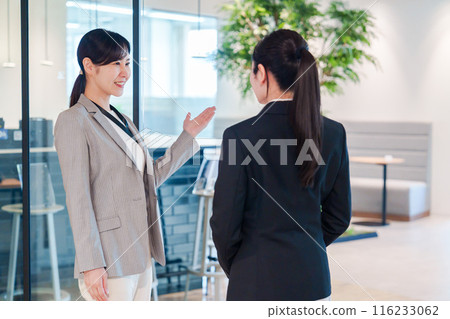 A woman looking for a job visiting an office 116233062