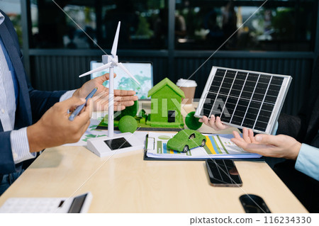 Business team people planning hand using laptop for working technology and business Net zero and carbon neutral concept.NET ZERO icons Business team people planning hand using laptop for working technology and business Net zero and carbon neutral concept.NET ZERO icons 116234330