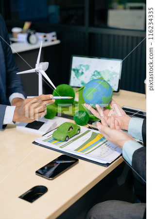 Business team people planning hand using laptop for working technology and business Net zero and carbon neutral concept.NET ZERO 116234335