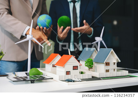 Business team people planning hand using laptop for working technology and business Net zero and carbon neutral concept.NET ZERO Business team people planning hand using laptop for working technology and business Net zero and carbon neutral concept.NET ZERO 116234357