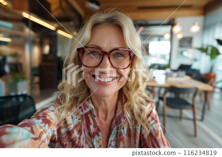 Blonde Woman Smiling in Office 116234819