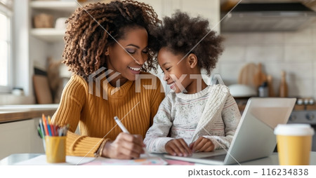 Mother Helping Daughter With Homework 116234838
