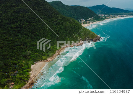 Coastline with mountains and ocean with waves in Brasil. Panoramic drone view Coastline with mountains and ocean with waves in Brasil. Panoramic drone view 116234987