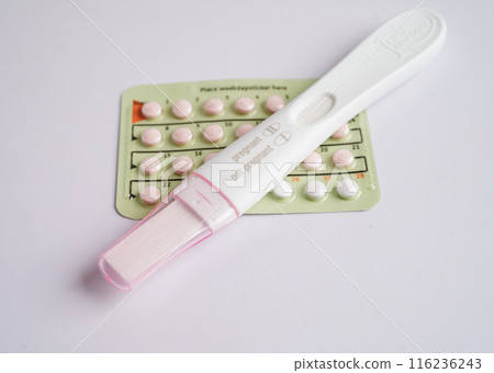 Pregnancy test with birth control pills for female of ovulation day, fetus, maternity, childbirth. 116236243