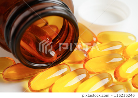 Fish oil or Cod liver oil gel in capsules with omega 3 vitamins, supplementary healthy food 116236246