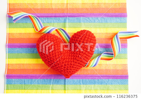 Red heart with rainbow color ribbon flag isolated on white background with clipping path, LGBT symbol. Red heart with rainbow color ribbon flag isolated on white background with clipping path, LGBT symbol. 116236375