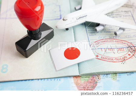 Bangkok, Thailand December 10, 2023 Japan Visa and passport document to immigration at airport in country. 116236457