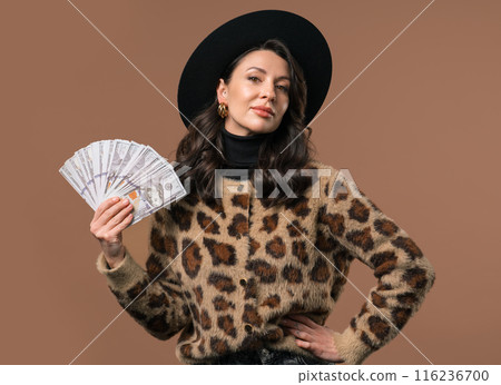 Rich excited mature 40s woman with cash money USD currency dollars banknotes Rich excited mature 40s woman with cash money USD currency dollars banknotes 116236700