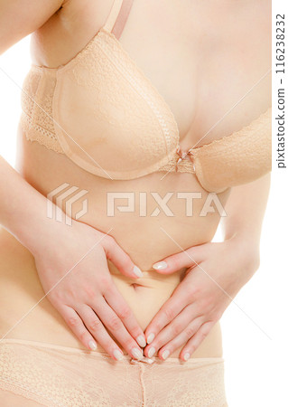Woman in lingerie with stomach pain 116238232